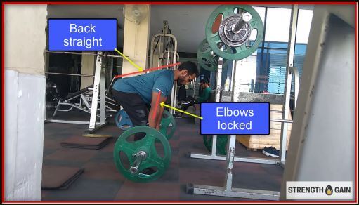 Doing barbell bent over rows with 40kg weight